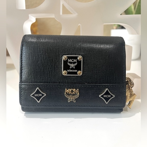 MCM SMALL BLACK LEATHER TRIFOLD WALLET - Picture 1 of 13